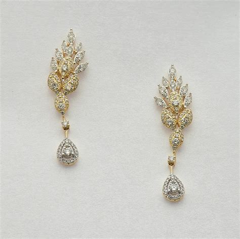 Fancy gold and diamond earrings