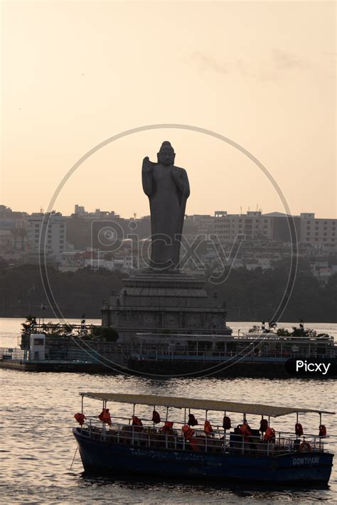 Image of Buddha Statue on Hussain Sagar Lake With Telangana Tourism Boat-OE224289-Picxy