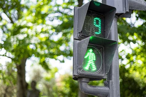 Green Traffic Light To Control Pedestrian Crossing with a Countdown To 1 Second. Stock Image ...