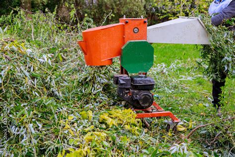 This is portable wood shredder chipper machine designed for reducing size wood chips produced by ...