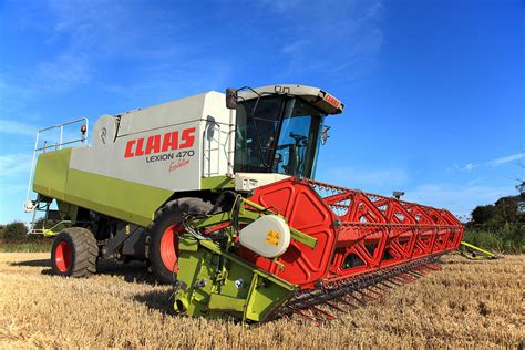 Claas Lexion 470 Evolution Combine Harvester Photograph by Paul Lilley