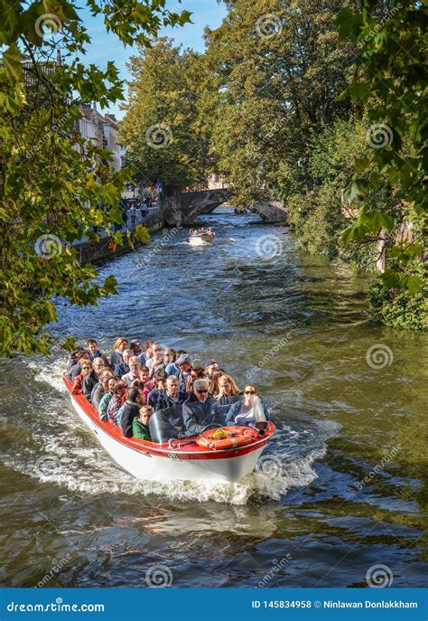 Canal Boat Tour in the Old Town of Bruges Editorial Stock Photo - Image ...