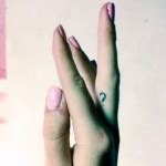 MØ's 12 Tattoos & Meanings | Steal Her Style | Page 2