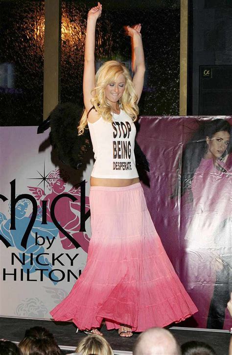 Paris Hilton Says 'Stop Being Poor' Shirt Was Photoshopped