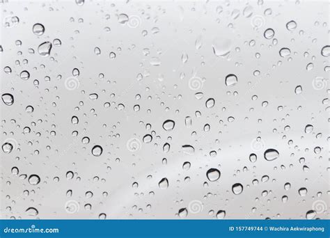 Rain drops on window glass stock photo. Image of drop - 157749744