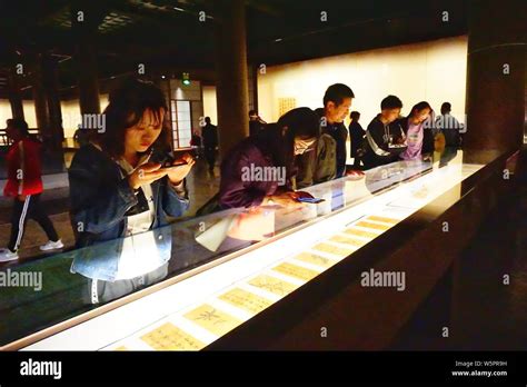 People enjoy the calligraphy and painting made by Emperor Qianlong of ...