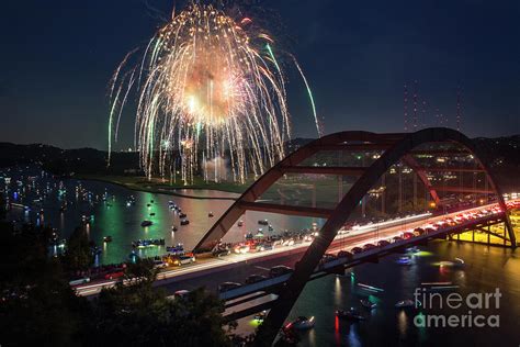 Colorful 4th of July fireworks explode over the 360 Bridge over Photograph by Dan Herron - Fine ...