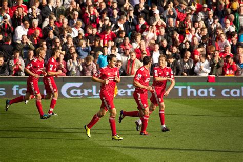 File:Liverpool players celebrate vs Bolton 1.jpg - Wikimedia Commons