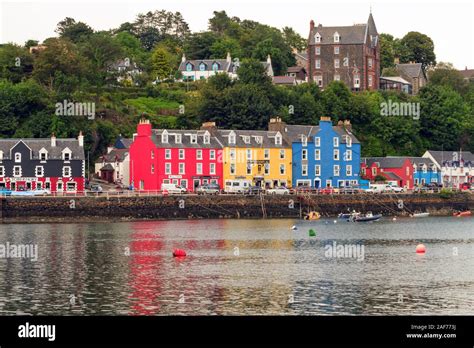 Colourful houses on the harbour at Tobermory on the Isle of Mull a ...