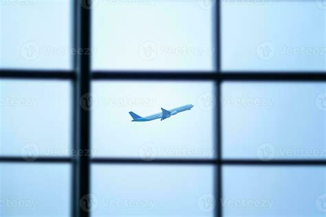 Airplane taking off behind the airport window 30726899 Stock Photo at ...