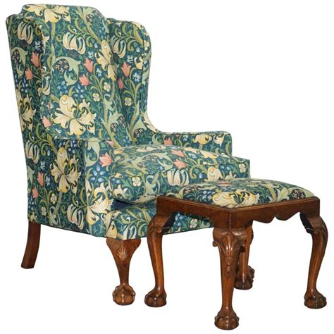 William Morris Georgian Irish Style Claw and Ball Walnut Wingback Armchair and Stool at 1stDibs ...