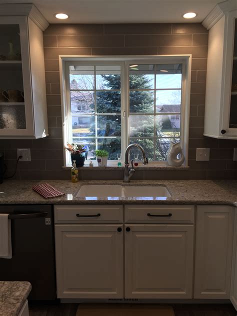 Full height backsplash. 4"x 12" subway tile. Cambria Quartz countertops. | Kitchen peninsula ...