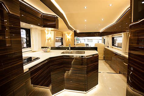 This $1.7 Million Luxury Motorhome has Its Own Side-Load Garage To Hold a Car