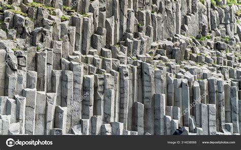 Basalt columns geological formation at Reynisfjara beach, Iceland ...