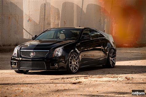 Bespoke Cadillac CTS Sitting on Custom Rims Fitted with Yellow Brake Calipers — CARiD.com Gallery