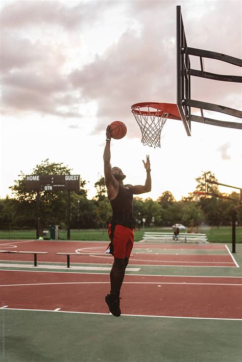 "An Attractive Young Black Man Playing Basketball O On A Sunny Day" by Stocksy Contributor ...