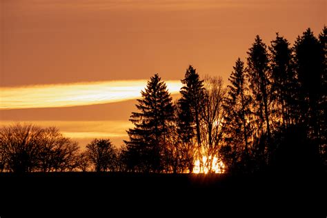 Black Mountain Under Brown Sky during Sunset · Free Stock Photo