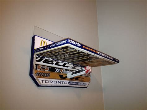 Hockey stick shelf. Hockey Stick Crafts, Hockey Sticks, Hockey Party ...