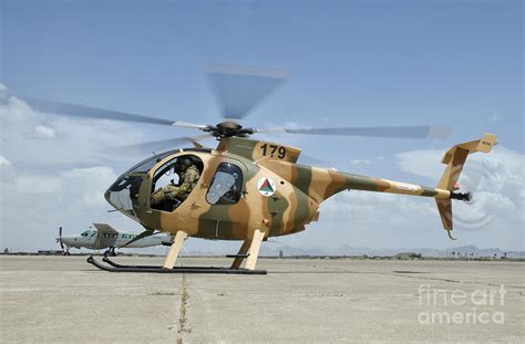 An Afghan Air Force Md-530f Helicopter Photograph by Giovanni Colla