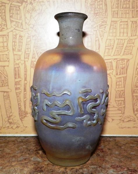 What is this small, THIN, Glass Bottle w/Raised Oriental Characters? | Antiques Board