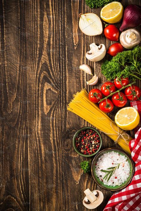 an overhead view of various foods on a wooden table