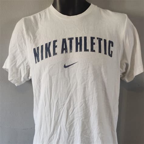 Vintage Nike Athletic white t-shirt centre swoosh... - Depop