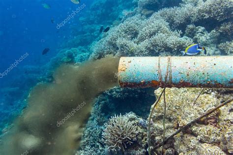 Underwater sewer pipe Stock Photo by ©stockfoto-graf 115171180