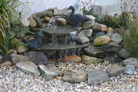 Aesthetically pleasing pondless waterfall #totalpond #pondless # ...