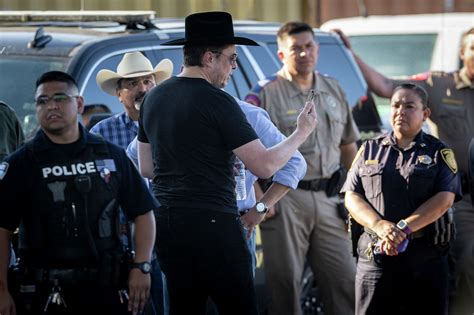 Elon Musk dons backward cowboy hat at US-Mexico border visit