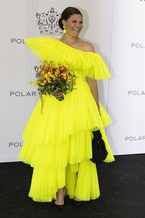 Crown Princess Victoria of Sweden wears neon yellow dress from H&M - pictures | Express.co.uk