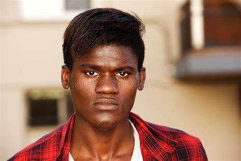 Close Up Serious Young African Man Staring in Front Stock Image - Image of adult, candid: 109816307