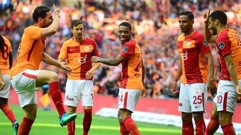 Galatasaray players celebrate after scoring another goal as they down ...