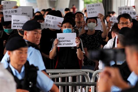 Hong Kong riots: Further clashes between police and protesters as hundreds remain on the street ...