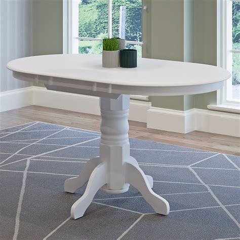 Dillon Extendable White Oval Pedestal Dining Table with 12in Butterfly Leaf