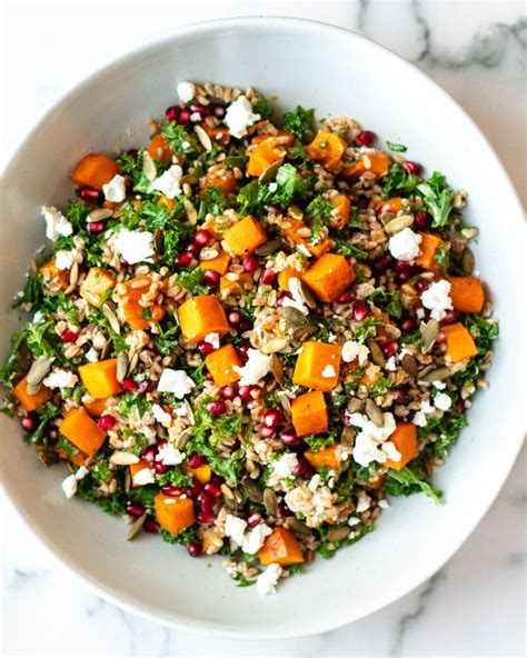 Fall Farro Salad with Butternut Squash, Kale, Pomegranate, and Goat Cheese • Daisybeet