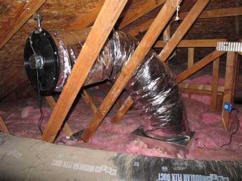 Pictures showing how a ducted whole house fan is installed