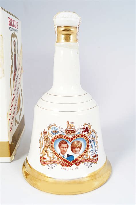 Sold Price: BELLS COMMEMORATIVE WHISKEY BOTTLE - June 2, 0119 10:30 AM IST