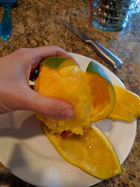 How To Peel A Mango - LifeUnprocessed.com Peeling A Mango, Yogurt And Granola, Mangoes, Toppings ...