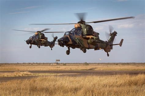 Australian Tiger Armed Reconnaissance Helicopters land after conducting security operations as ...