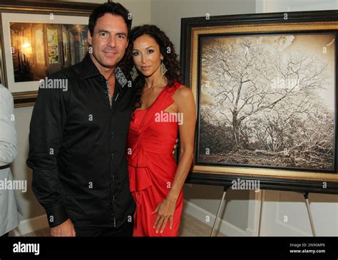 Mark Steines, left, and actress Sofia Milos attend the Mark Steines photography debut exhibit at ...