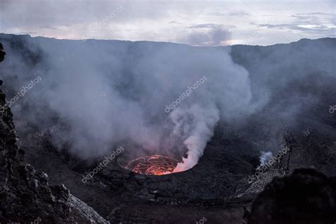 Crater of nyiragongo volcano in eruption — Stock Photo © lifeonwhite ...