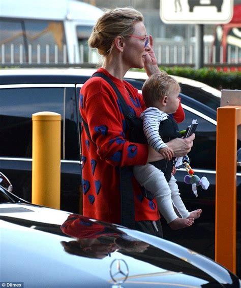 Cate Blanchett beams as she arrives back in Sydney with daughter Edith ...