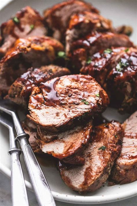 Hands down the BEST, ultra tender pork tenderloin with a balsamic glaze made right in the pre ...