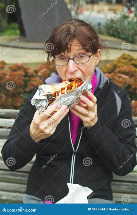 Woman Eating Junk Food Outside Stock Photo - Image of lunch, health: 5898844