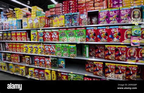 Walmart Retail grocery store interior cereal aisle wide pan Stock Video ...