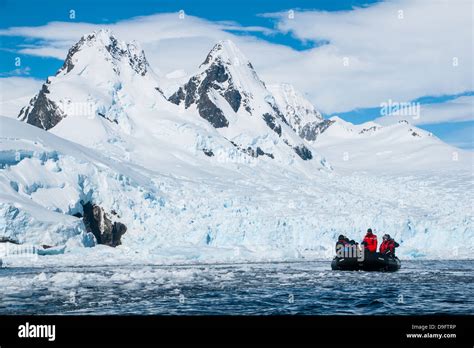 Tourists in a Zodiac in front of glaciers in Cierva Cove, Antarctica, Polar Regions Stock Photo ...