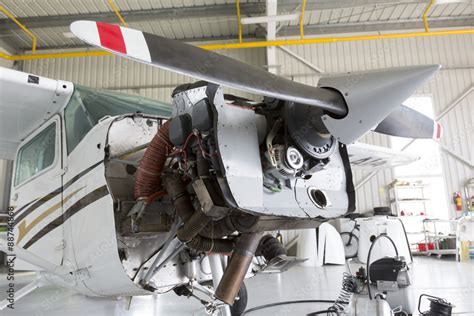 Repairing small propeller airplane Stock Photo | Adobe Stock