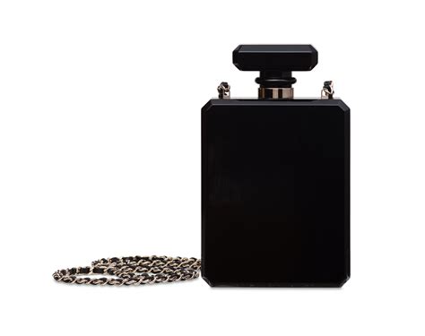 A BLACK PERFUME BOTTLE MINAUDIÈRE WITH GOLD HARDWARE , CHANEL, 2013 | Christie's