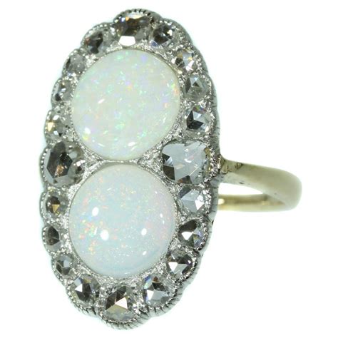 Antique Victorian Engagement Ring with Rose Cut Diamonds and Cabochon Opals For Sale at 1stDibs