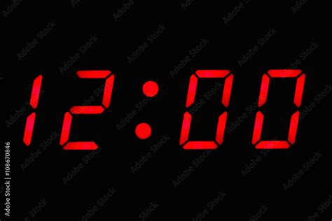 Digital clock displaying 12:00 o'clock Stock Photo | Adobe Stock